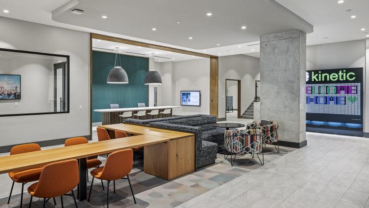 Lounge with counter and chairs, couches, and booths