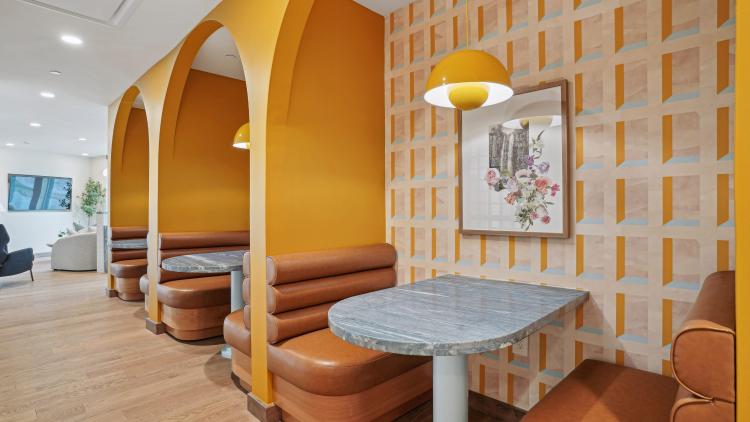 Small booths separated by half walls