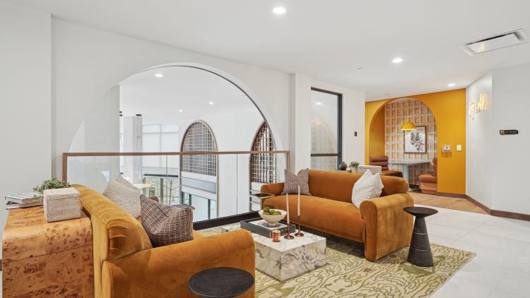 Stair landing with sofas and open space