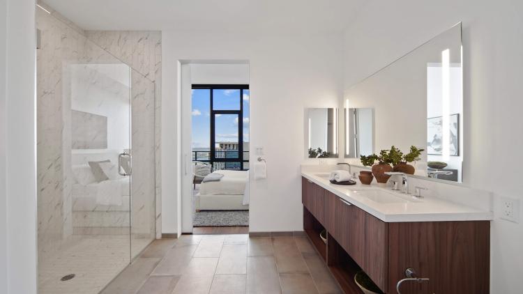 Large clean bathroom counter and mirror