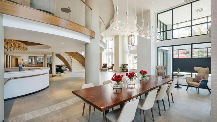 Lobby area with a wood dining table and chairs