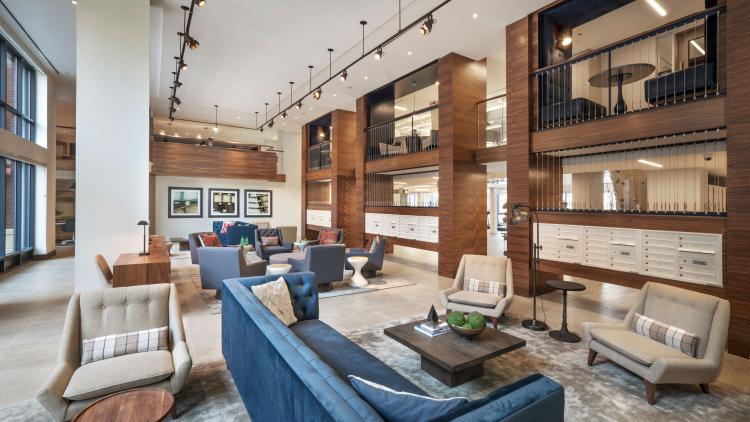 Casual seating area with mailbox slots along one wall