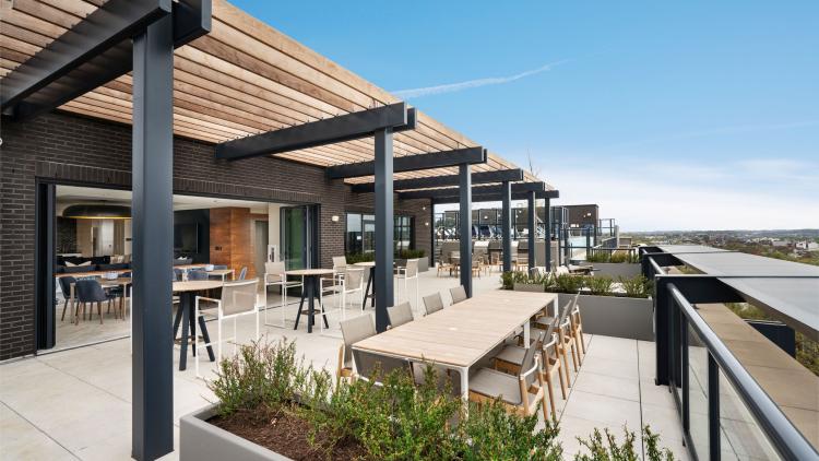 Outdoor deck with picnic tables and bistro table sets